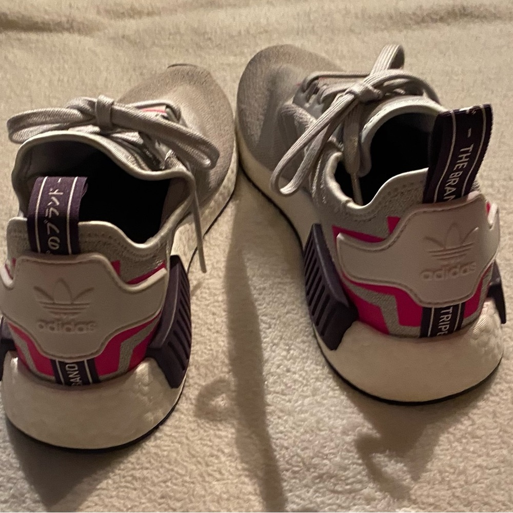 Woman’s adidas tennis shoe